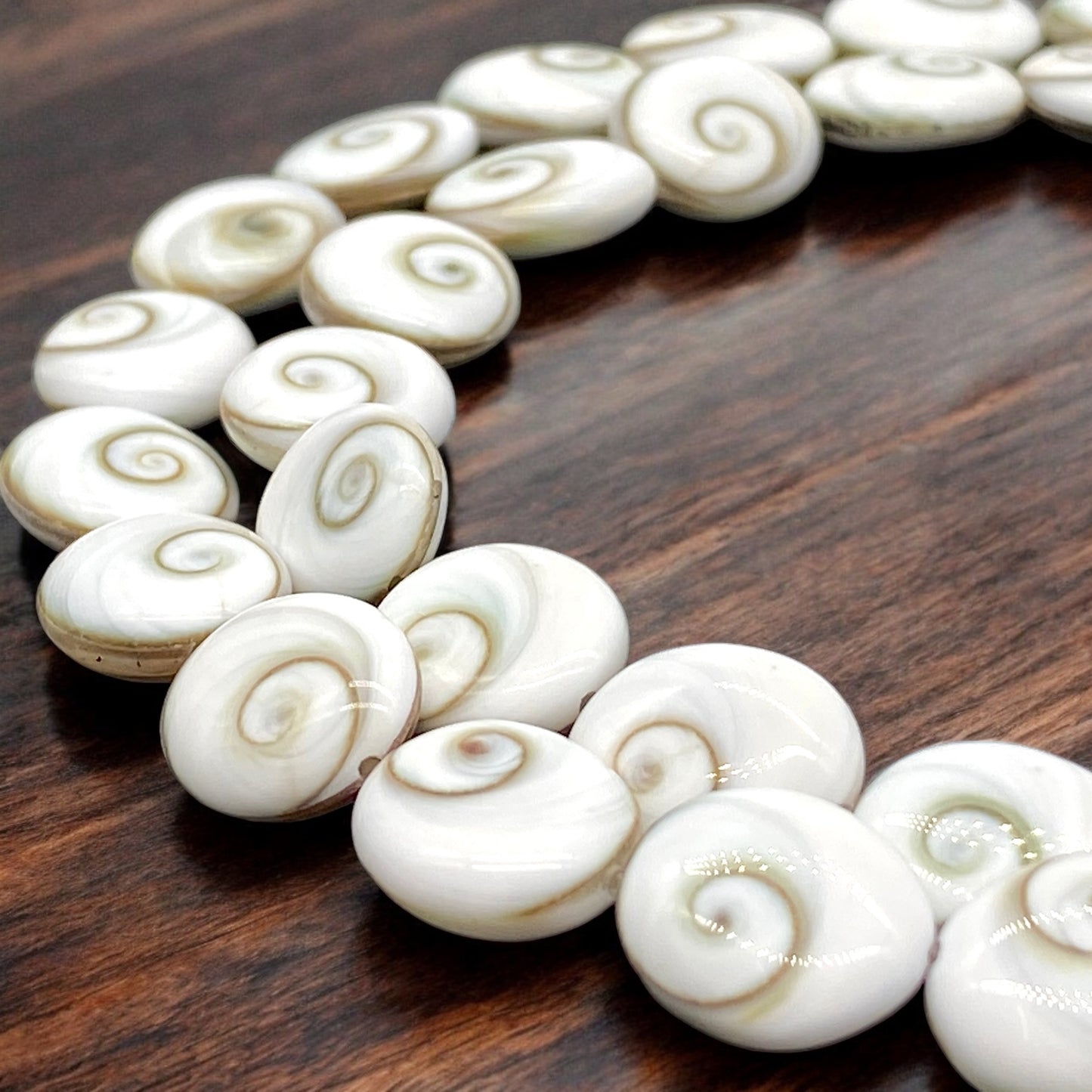 Shiva Eye Shell Beads From Pacific Ocean (AAA Whitest White Quality - Every Bead Made From Two Operculum Shells - Matching Spiral Matrix) Chakra Energy Doublet Oval Shape (Protective Door of the Snail Shell)